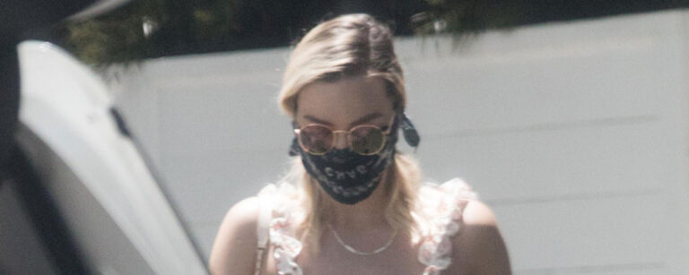 Pictured Leaving Her House